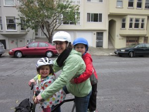 Yep, that's two kids on one Brompton bicycle. We are our own clown car.