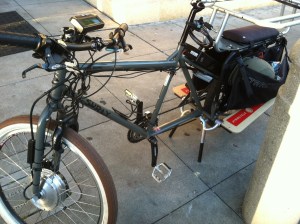 This Surly has the motor on the front wheel, along with the clever wheel lock.