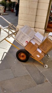 This is a Venetian handtruck: pull it up the stairs and the load stays steady, then flip it around and bounce it down.