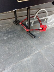 Locked to a floor anchor through the kickstand: this is cool.